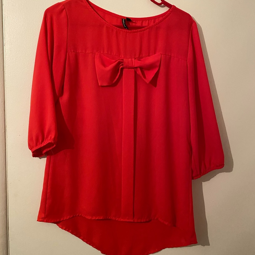 Orange bow blouse